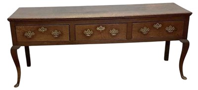 Lot 690 - An early 19th century oak dresser base, with...