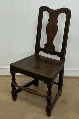Lot 777 - An 18th century oak side chair, with solid...