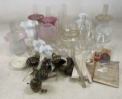 Lot 670 - A large collection of various lamp funnels and...