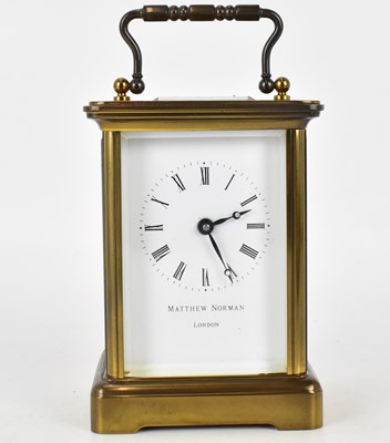 Lot 130 - MATTHEW NORMAN, LONDON; a brass carriage clock,...