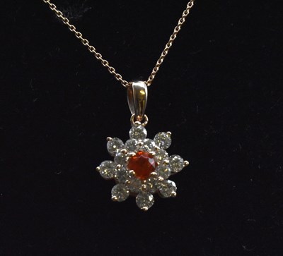 Lot 515 - A 14ct rose gold diamond and fire opal set...