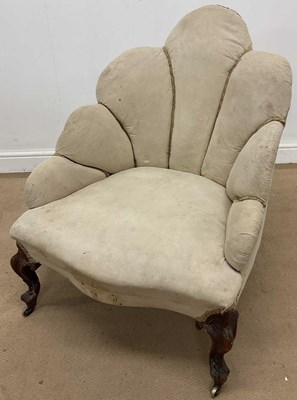 Lot 722 - A Victorian cloud back easy chair raised on...