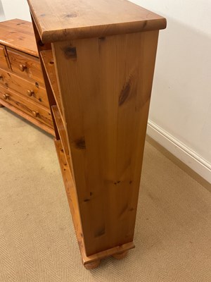 Lot 745 - A pine bookcase with two shelves, 98 x 84 x...