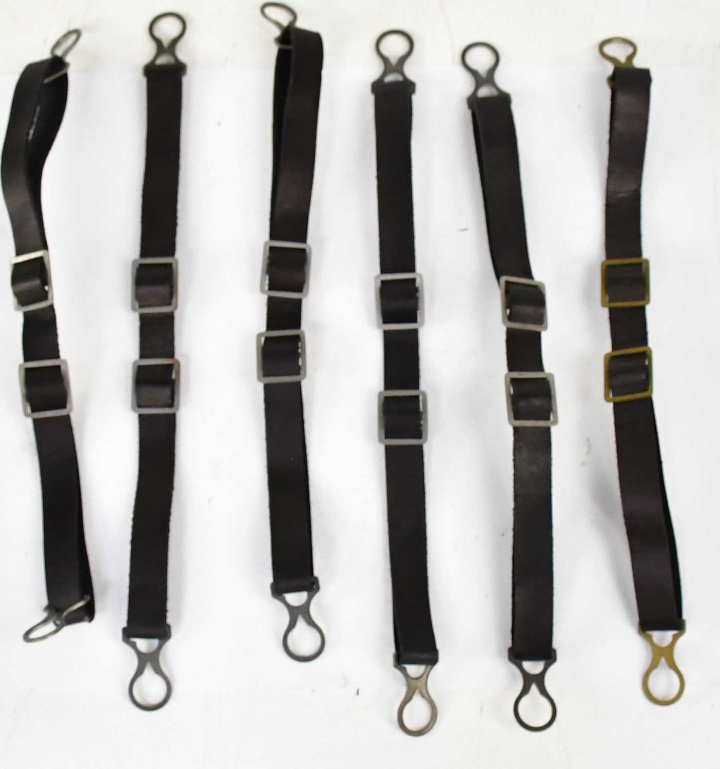 Lot 490 - Six reproduction Pickelhaube M91 leather chin...