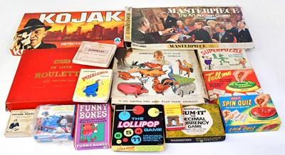 Lot 465 - A collection of vintage toys, to include Merit...