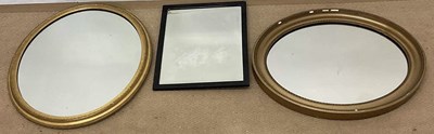 Lot 797 - Three mirrors, two oval examples with gilt...