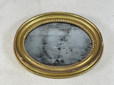 Lot 798 - A small 19th century oval gilt framed wall...