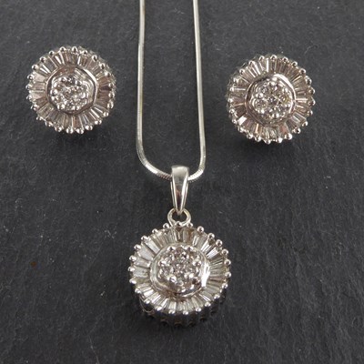 Lot 1213 - A 14ct white gold diamond floral cluster...