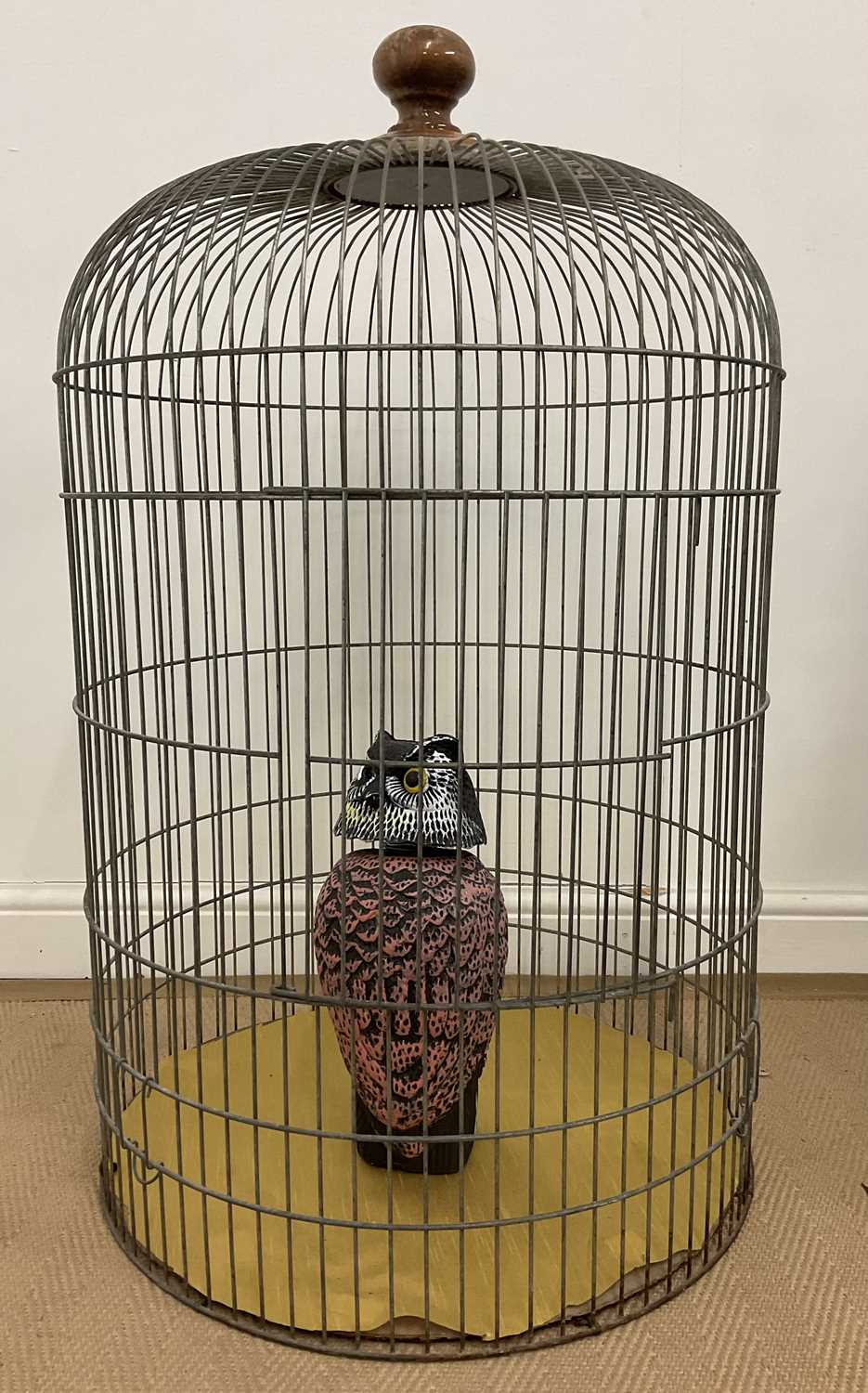 Lot 33 - A large bird cage, with a painted wooden owl...