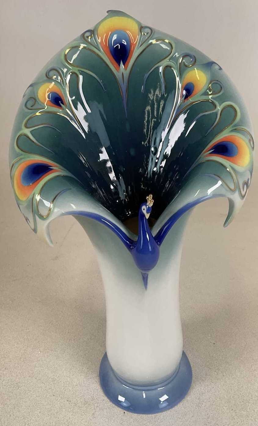 Lot 219 - FRANZ PORCELAIN; a peacock vase, numbered...