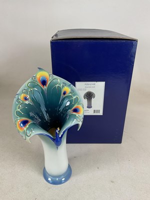 Lot 219 - FRANZ PORCELAIN; a peacock vase, numbered...