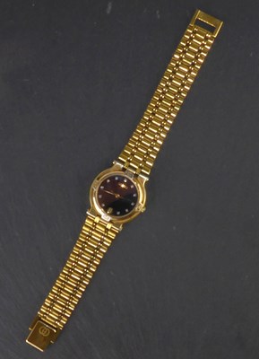 Lot 1397 - GUCCI; a ladies' gold plated wristwatch,...