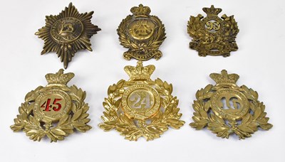 Lot 470 - Six large regimental military cap badges,...
