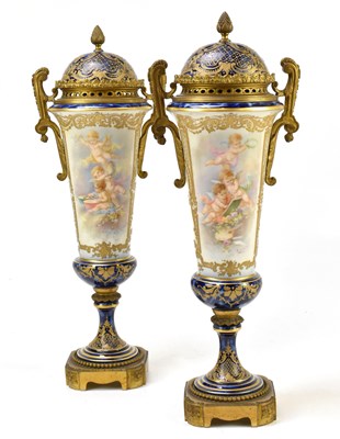 Lot 437 - COLLOT FOR SERVRES PORCELAIN; a pair of impressive pedestal vases and covers