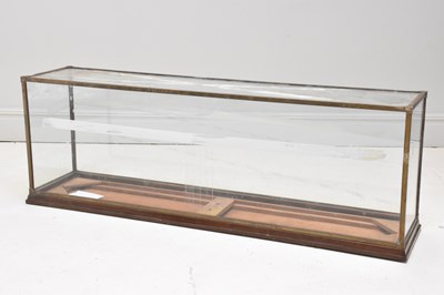 Lot 1223 - A large brass framed glazed display case,...