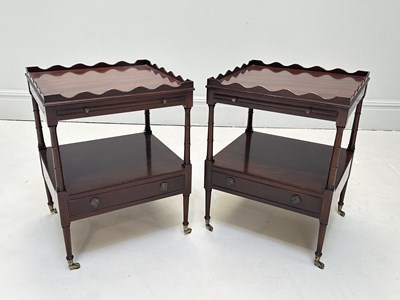 Lot 1114 - A pair of reproduction mahogany two tier lamp...