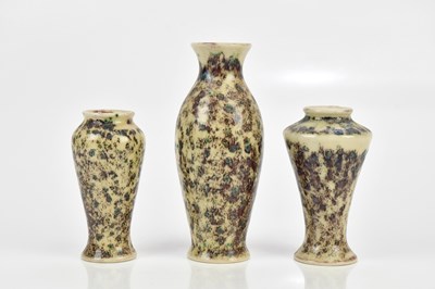 Lot 560 - COBRIDGE; three experimental glazed vases, in...