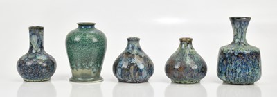 Lot 517 - COBRIDGE; five small vases, each decorated...