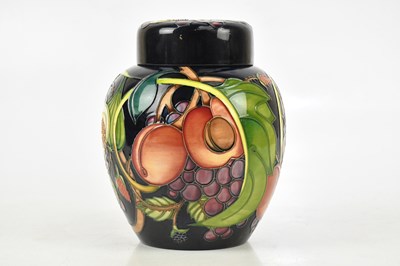 Lot 95 - EMMA BOSSONS FOR MOORCROFT; a large ginger jar...