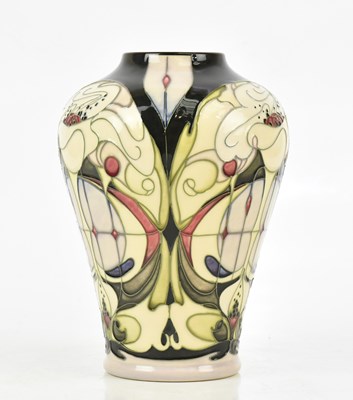 Lot 112 - EMMA BOSSONS FOR MOORCROFT; a vase of...
