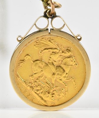 Lot 222 - A George V full sovereign, 1928, in 9ct mount,...