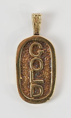 Lot 251 - A 9ct yellow gold textured pendant inscribed...