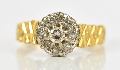 Lot 446 - An 18ct yellow gold diamond set cluster ring,...