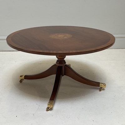 Lot 1131 - A reproduction mahogany circular occasional...