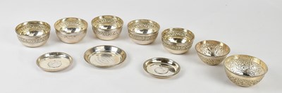 Lot 2339 - A collection of seven Eastern white metal...