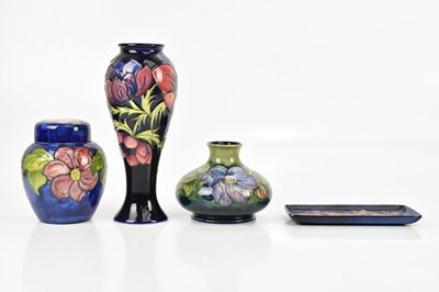Lot 2614 - WALTER MOORCROFT; a squat vase decorated in...