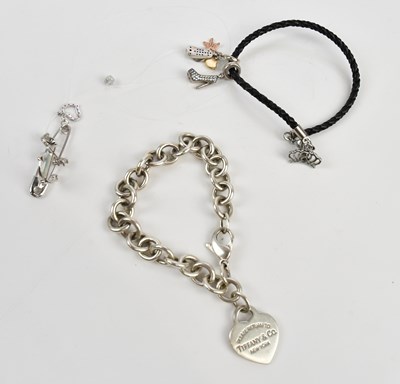 Lot 56 - TIFFANY & CO; a sterling silver bracelet with...