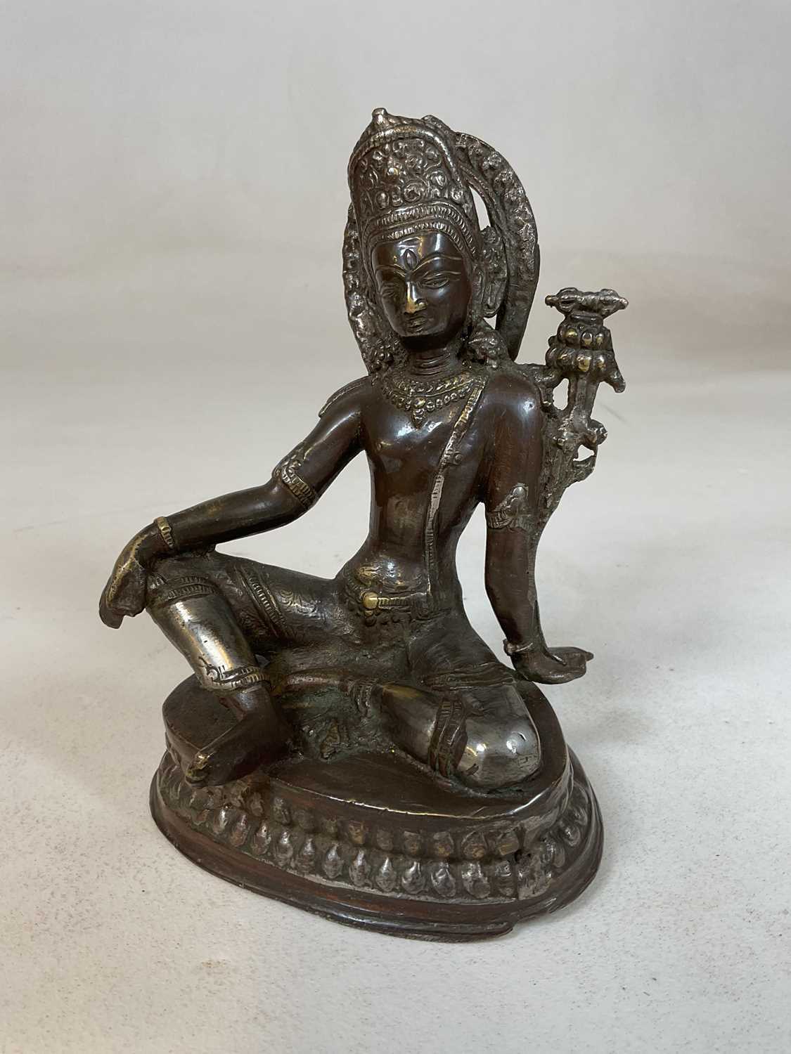 Lot 313 - A 19th century Sino-Tibetan bronze figure of a...