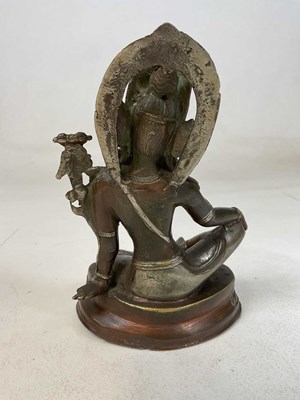 Lot 313 - A 19th century Sino-Tibetan bronze figure of a...