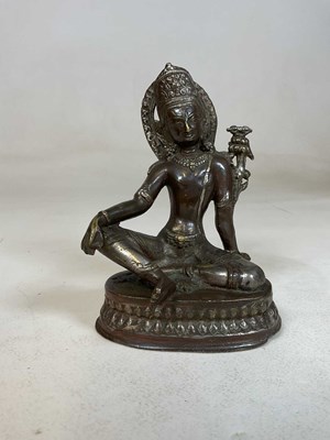 Lot 313 - A 19th century Sino-Tibetan bronze figure of a...