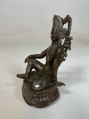 Lot 313 - A 19th century Sino-Tibetan bronze figure of a...