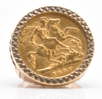 Lot 571 - A Victorian half sovereign, 1897, in 9ct gold...