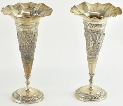 Lot 1158 - A pair of Indian white metal trumpet vases,...