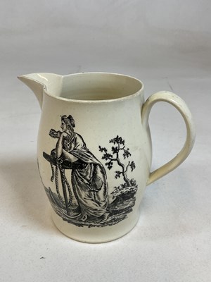 Lot 245 - A late 18th century creamware jug decorated...