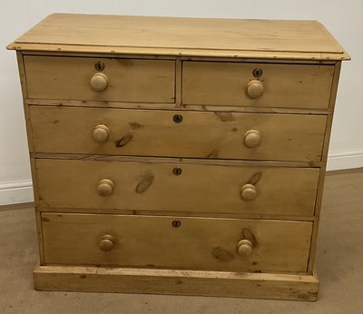 Lot 707 - A pine chest of two short over three long...