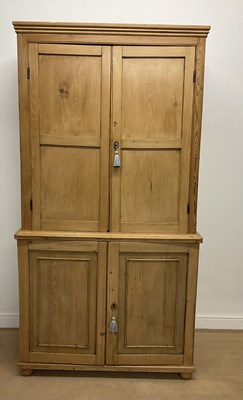 Lot 709 - A pine linen cupboard, the upper section...