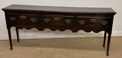 Lot 688 - A George III oak dresser base, height 77cm,...