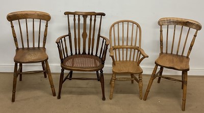 Lot 788 - A child's hooped back Windsor elbow chair,...