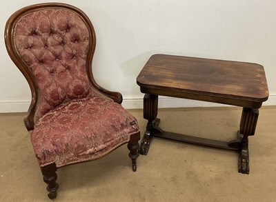 Lot 786 - A Victorian button back chair raised on...