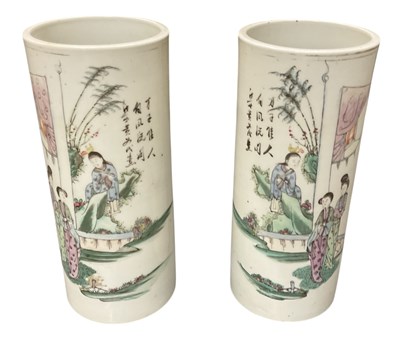 Lot 1016 - A pair of Chinese Famille Rose cylindrical...