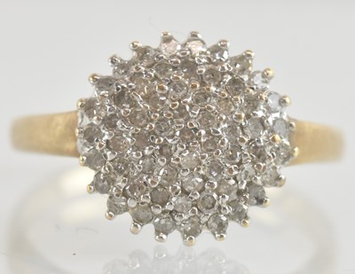 Lot 1224 - A gold diamond cluster ring, size Q, approx 3.4g.
