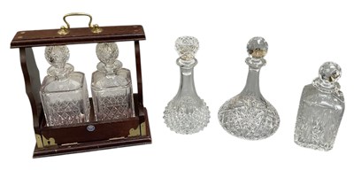 Lot 619 - THOMAS WEBB; a modern oak framed tantalus...