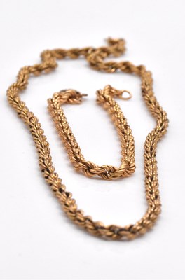 Lot 484 - A 9ct yellow gold rope twist chain, length...