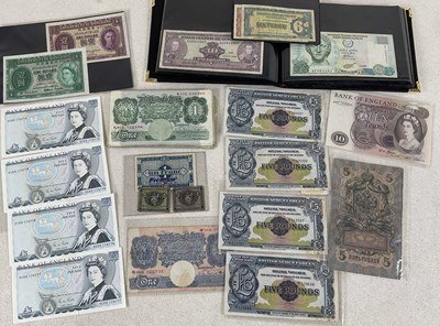 Lot 630 - A group of banknotes, some British, some world,...