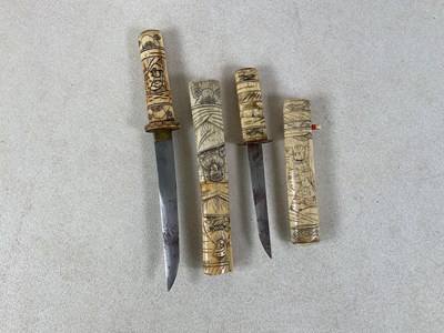 Lot 55 - Two Japanese tanto, both with carved bone...
