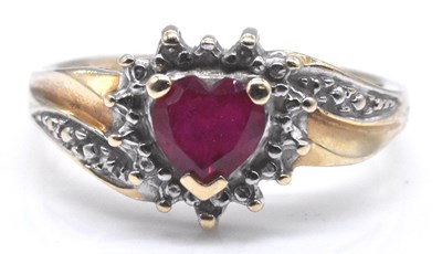 Lot 536 - A 9ct yellow gold simulated ruby and diamond...